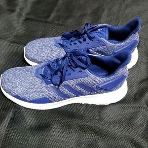 Navy blue and white Adidas
